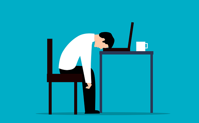 Sleepy Man at computer Desk