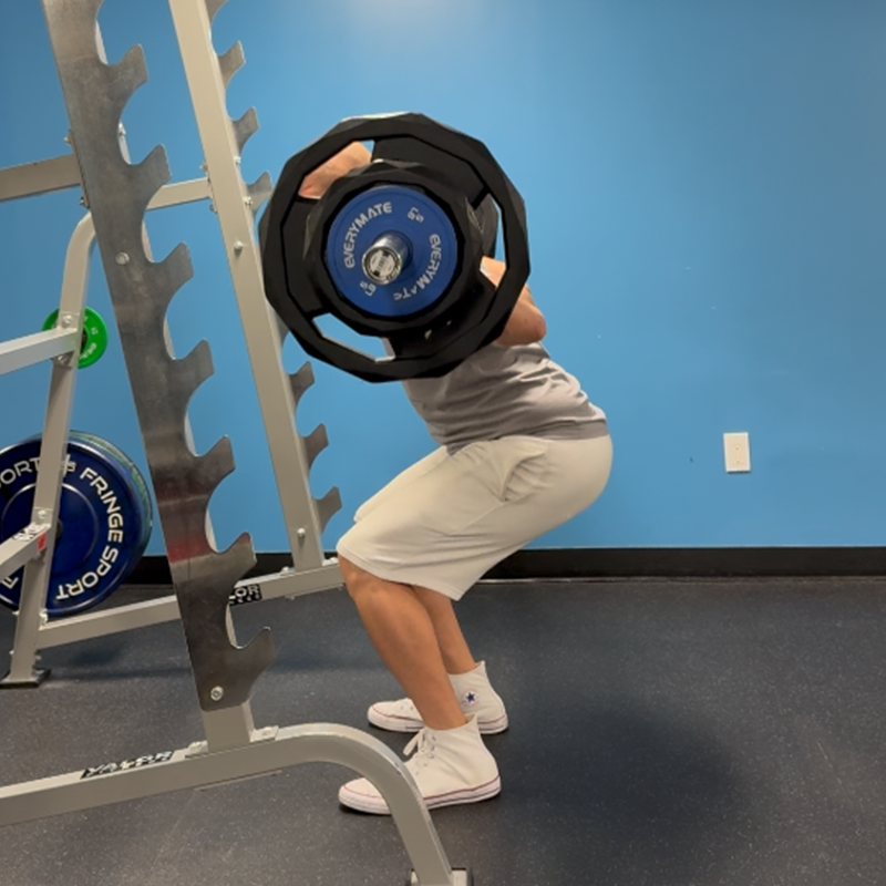 jamal habib barbell squats gray and white